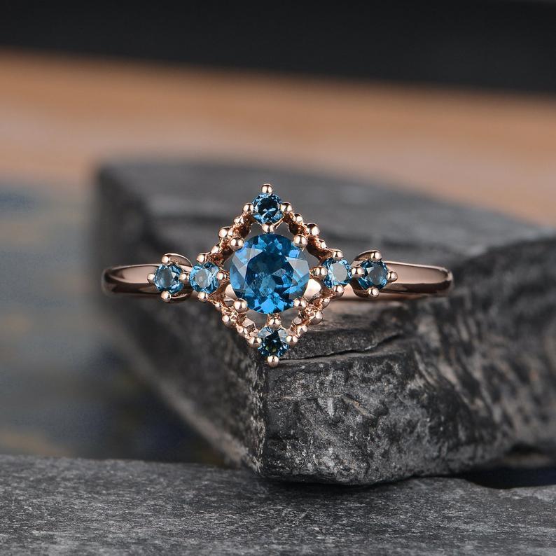 Rose gold blue topaz ring online