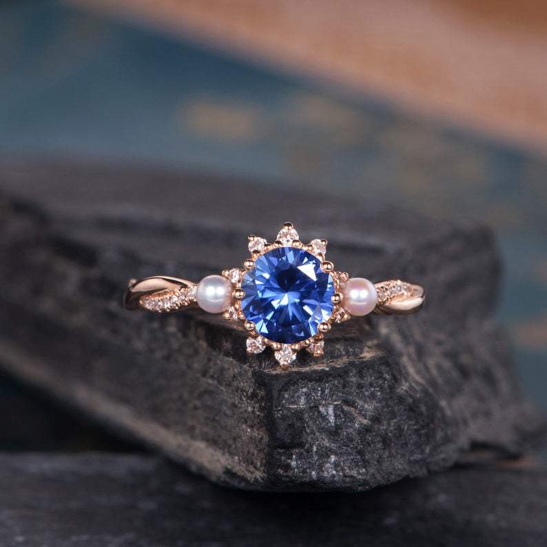 Rose gold and store sapphire engagement ring