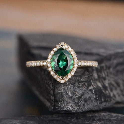 14Kt Yellow gold designer Solitaire Marquise Shape Emerald, Halo Natural diamond ring by diamtrendz